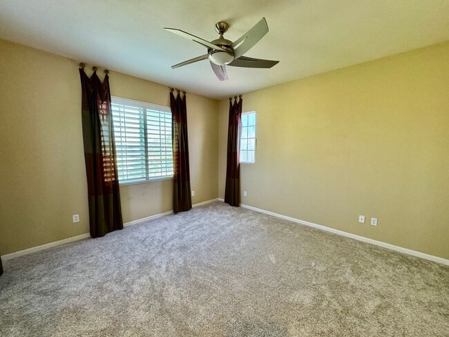 Building Photo - Located in a peaceful and well-maintained senior community, this spacious 3-bedroom, 3.5-bath Plu...