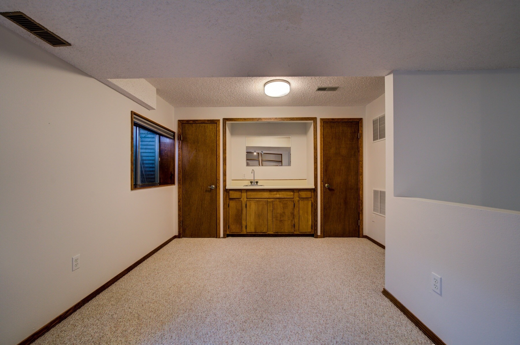 Basement wet bar in study area - 5165 Granby Cir