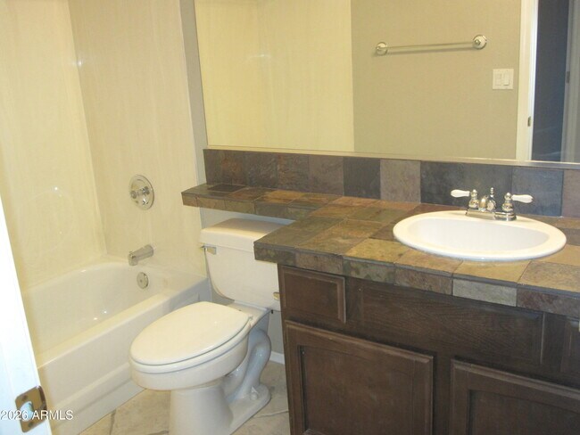 Building Photo - 6335 W Donald Dr