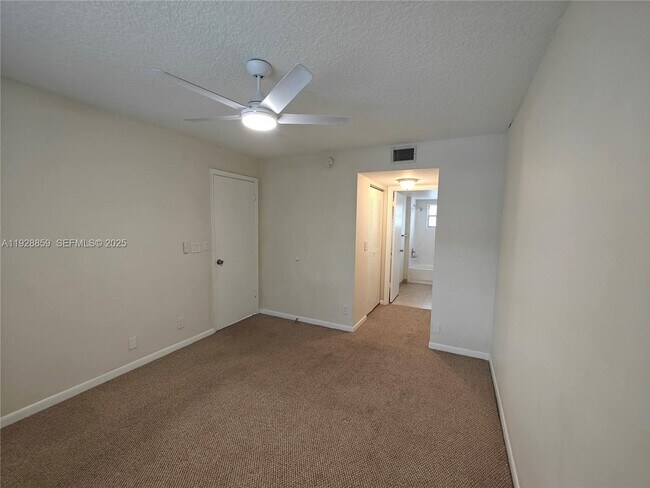 Building Photo - 8770 Royal Palm Blvd