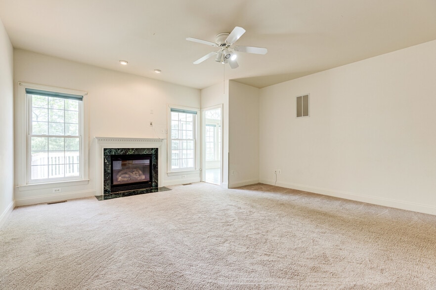 Family room with gas fireplace - 25634 Creek Run Ter