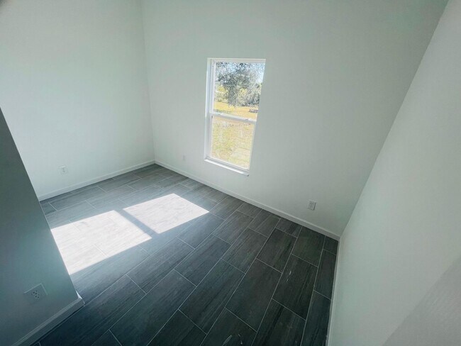 Building Photo - NEW CONSTRUCTION-  Modern 3 Bed / 2 Bath Home in Lehigh Acres