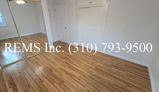 Building Photo - Bright and Renovated Upstairs Apartment w/ Laundry & Parking
