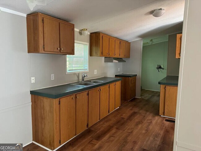 Building Photo - Rent Reduced!