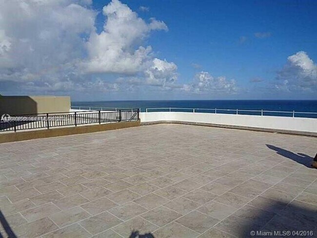 Building Photo - 5555 Collins Ave