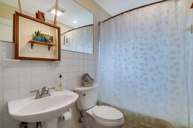 Building Photo - Discover Your Austin Oasis: Revitalized Bungalow with Hardwood Floors and Entertainer's Deck!