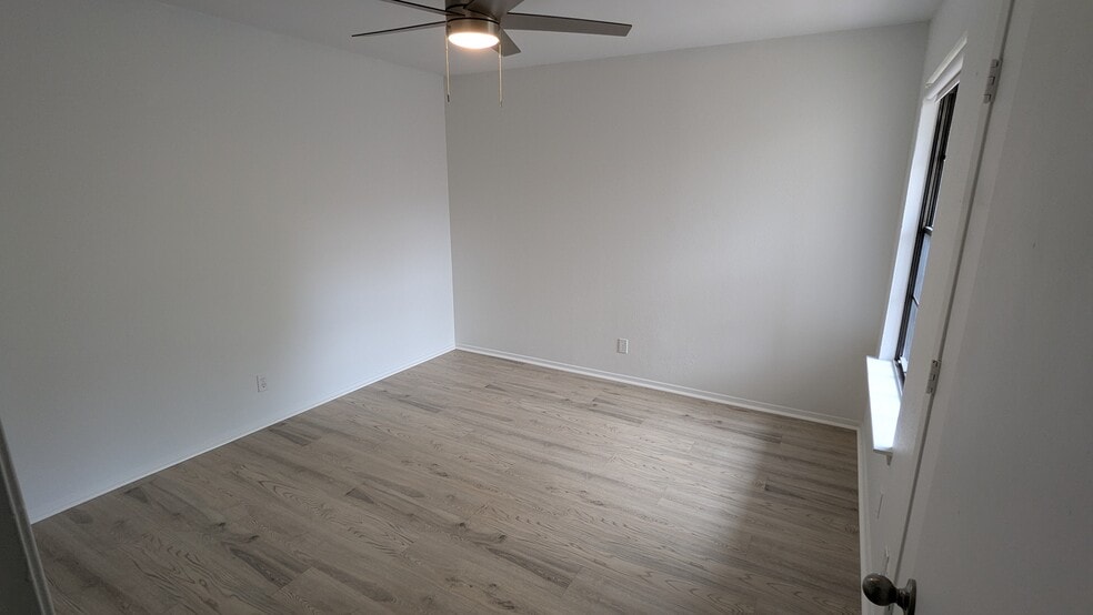 Living Area with Doors to Balcony - 5200 Martel Ave