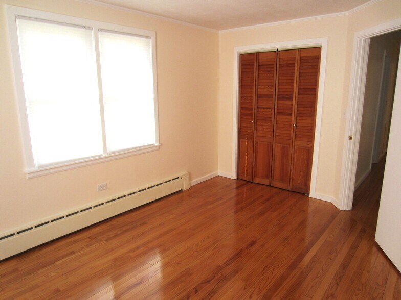 Bedroom 2 with closet and wood floors - 30 Fairfield Ave