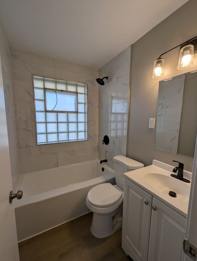 Building Photo - Fully Renovated Home with Sunroom, Garage & Huge Fenced Yard