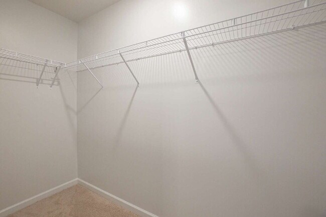 Building Photo - Partially furnished and now available!