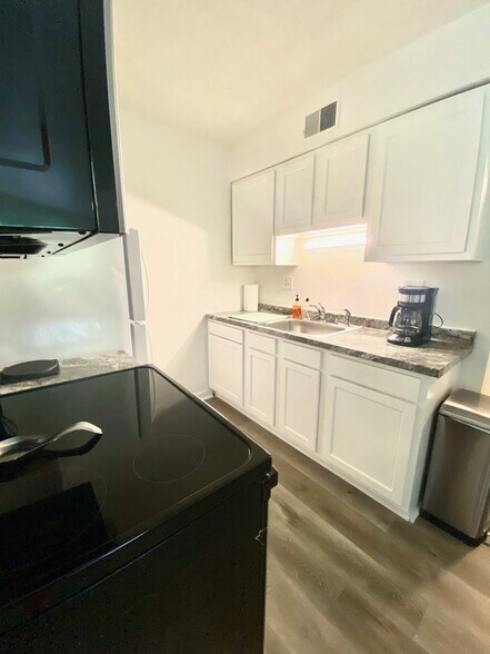 Brand new furnished and stocked kitchen - 145 E Wellington Ave