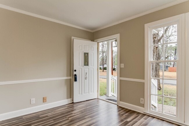Building Photo - Three bedroom two bath