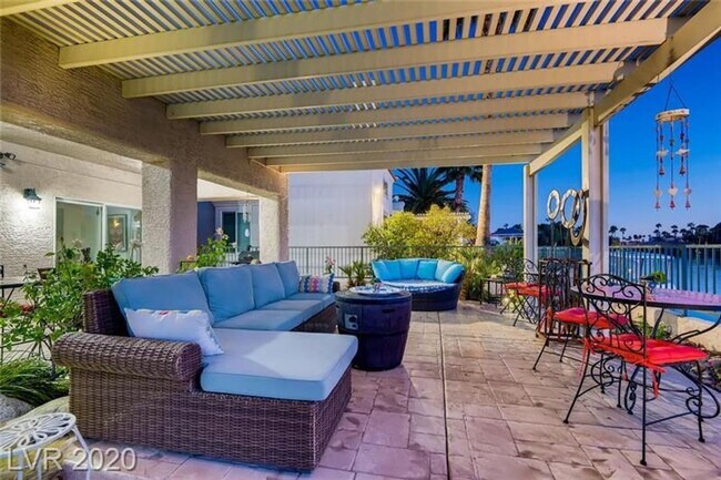 Building Photo - Vegas's Only Available Waterfront Rental ~ 4 Bedroom Desert Shores Lake Front Home