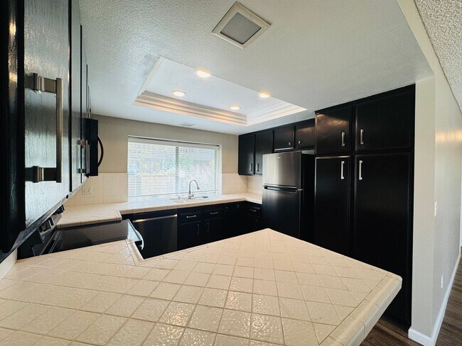 Building Photo - Don’t Judge the Outside—This 3BR Stuns Inside