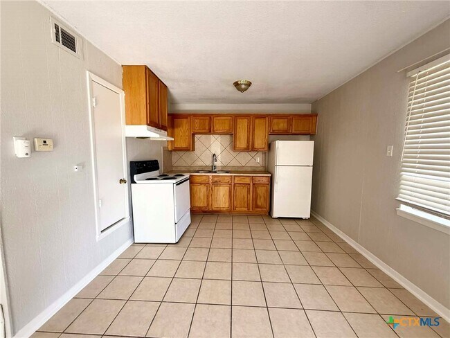 Building Photo - 1805 N W S Young Dr