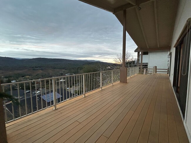 Building Photo - 6367 Woodman Dr