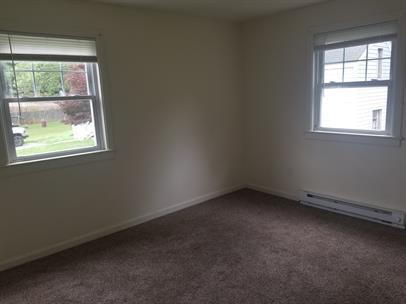 Building Photo - August Special -1/2 off Application Fee Charming 2BR Apartment with Spacious Courtyard & Lawn Car...