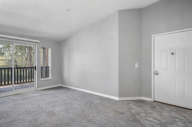 Building Photo - 2BR Condo w/ Vaulted Ceilings, W/D, Parking & Amenities | Utilities Included