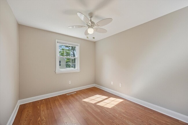 Building Photo - Available Immediately – 4 Bedroom End-Unit...