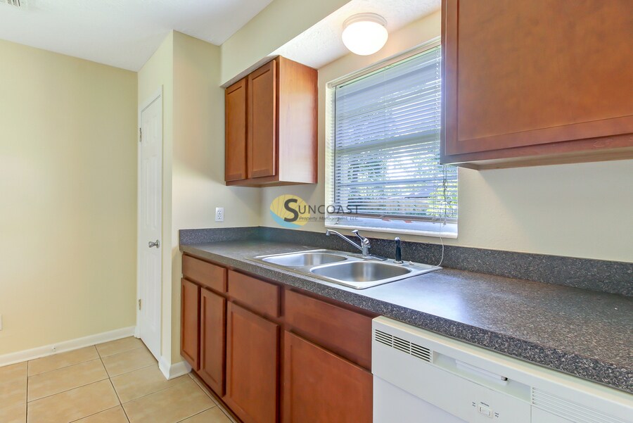 Building Photo - 7438 Jade Dr N