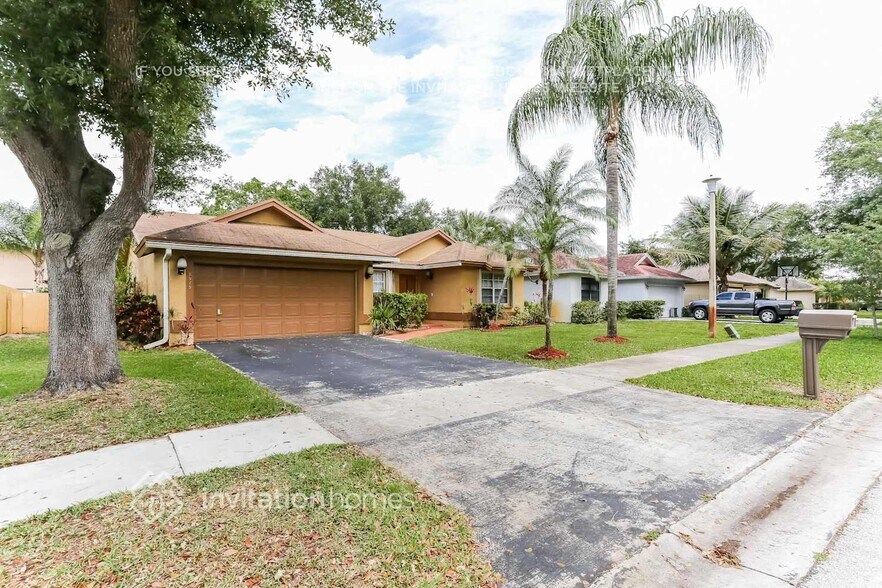 Building Photo - 9575 NW 25th Ct