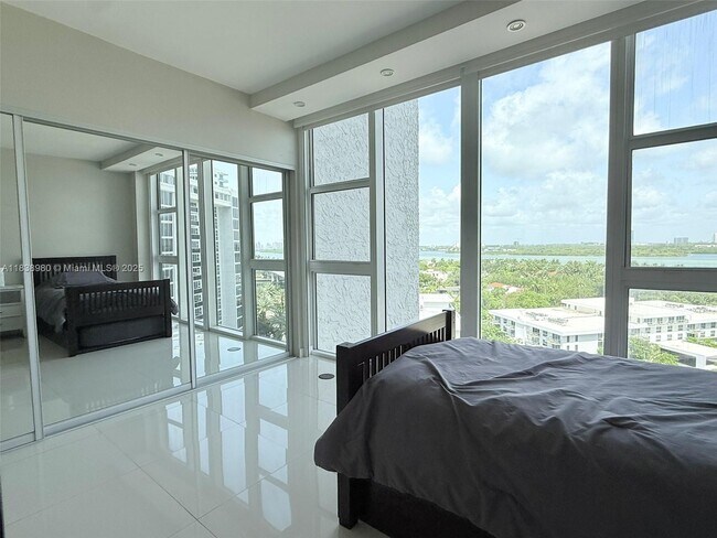 Building Photo - 10275 Collins Ave