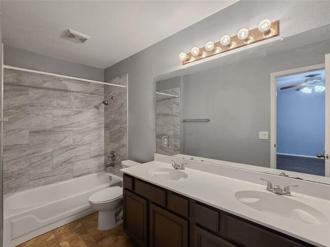 Building Photo - 9511 Woodvale Dr