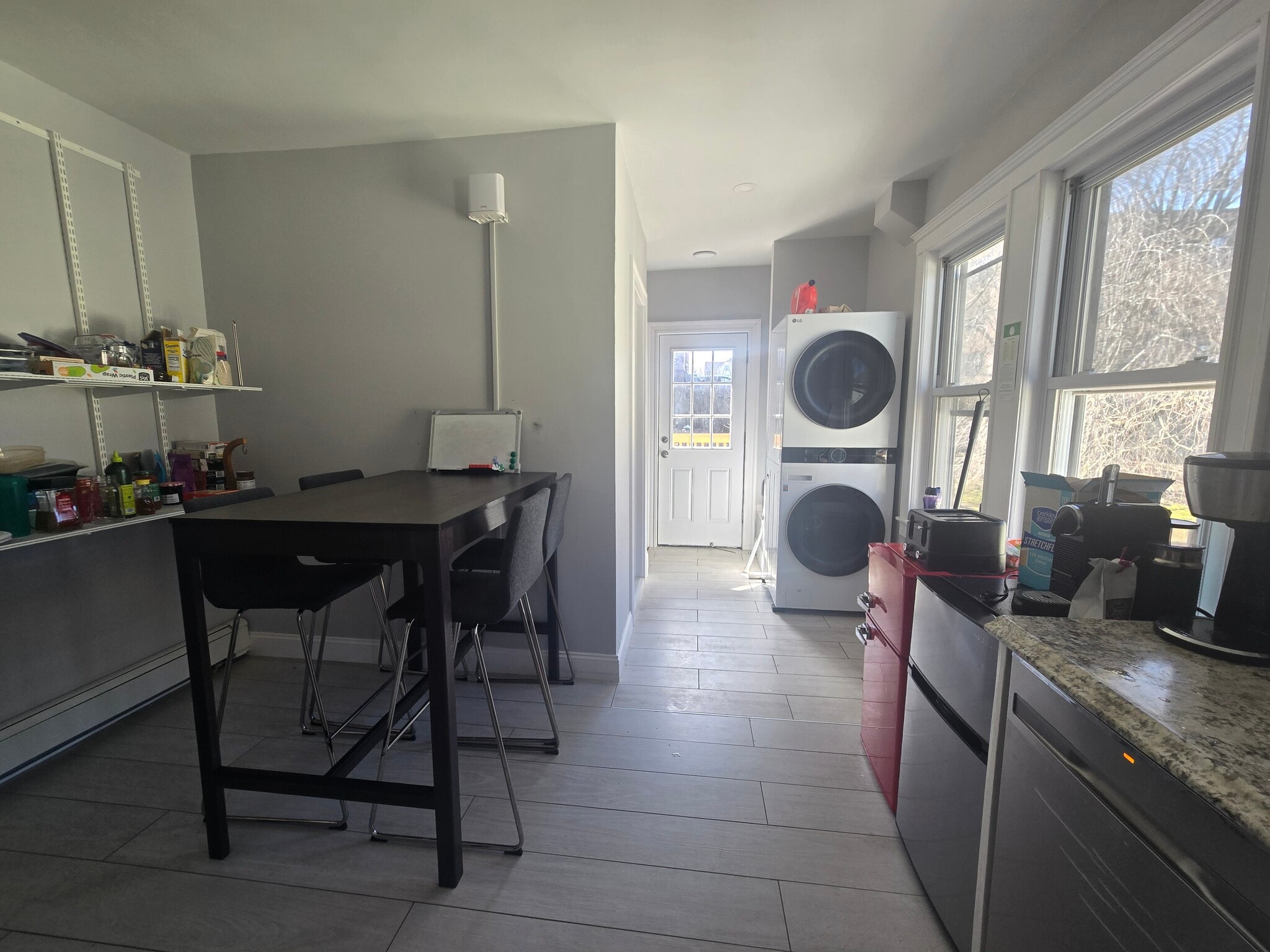 in unit washer-dryer and dining area - 81 Bow St