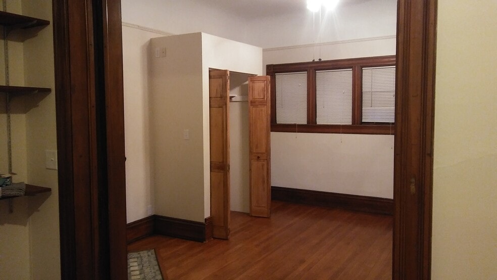 Bedroom (window treatments included) - 1562 E Irving Plz