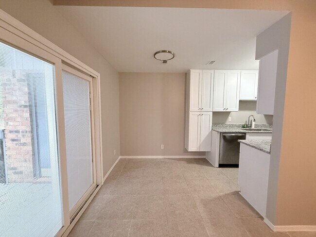 Building Photo - Charming 2-Bed, 2-Bath Condo with Granite Finishes Ready for Move In.