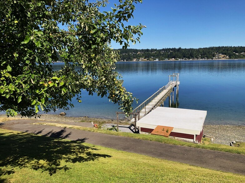 dock and boathouse included in the property rental - 7107 120th St NW