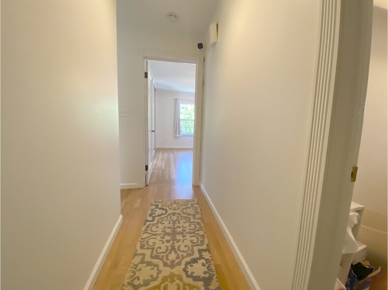 Hallway to master bedroom and laundry room - 9 Scenic Ave