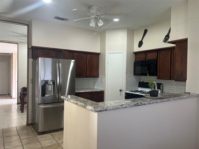 Building Photo - 10907 Spring Harvest Dr