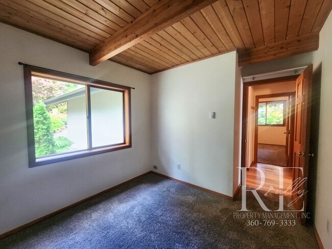 Building Photo - Waterfront Living in Indianola – Dock, Bea...