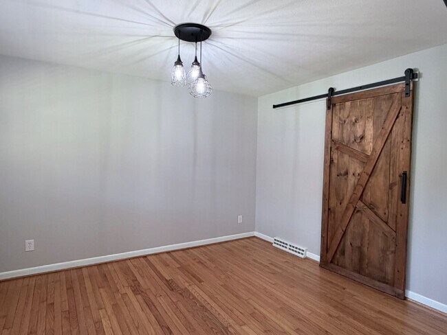 Building Photo - Updated 3BR Home in Beaver Lake | Fenced Yard, Garage, Covered Porch & Outdoor Fireplace | Pet Fr...