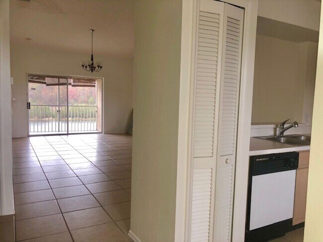 Building Photo - Nice 2X2 located on 2nd floor- Tile & lami...