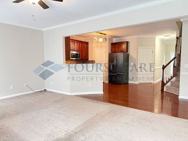 Building Photo - Lovely 3-Bedroom Townhome with Fireplace, Back Patio  & Community Amenities Included! Convenient ...