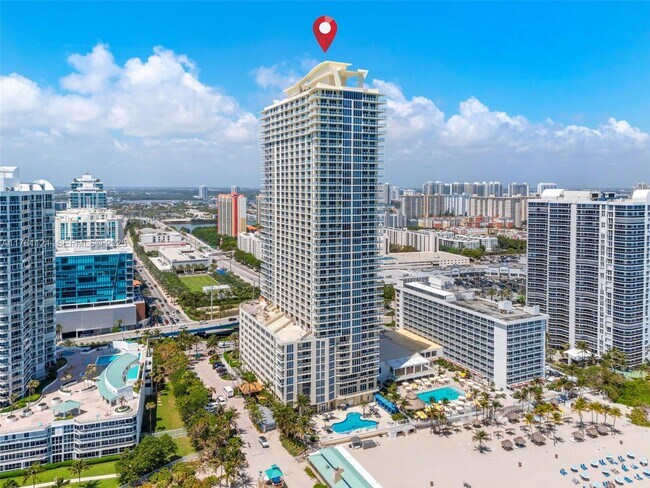 Building Photo - 16699 Collins Ave