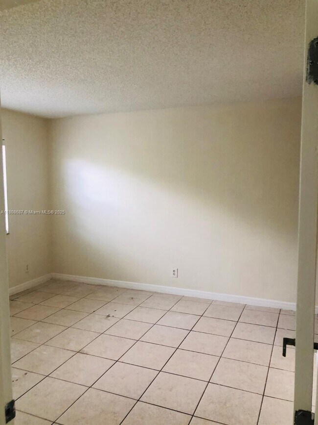 Building Photo - 11213 Royal Palm Blvd