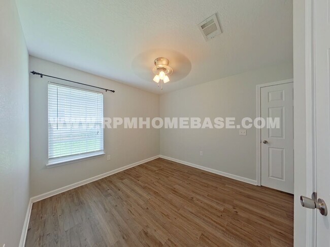Building Photo - Your Baker Sanctuary with Spacious Backyar...