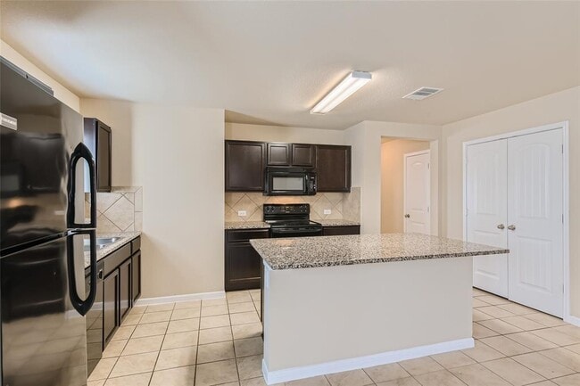 Building Photo - 5704 Montrelia Dr