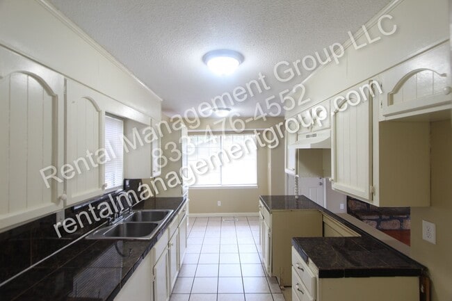 Building Photo - New On The Market! 3BR 2BA + Lower Level D...