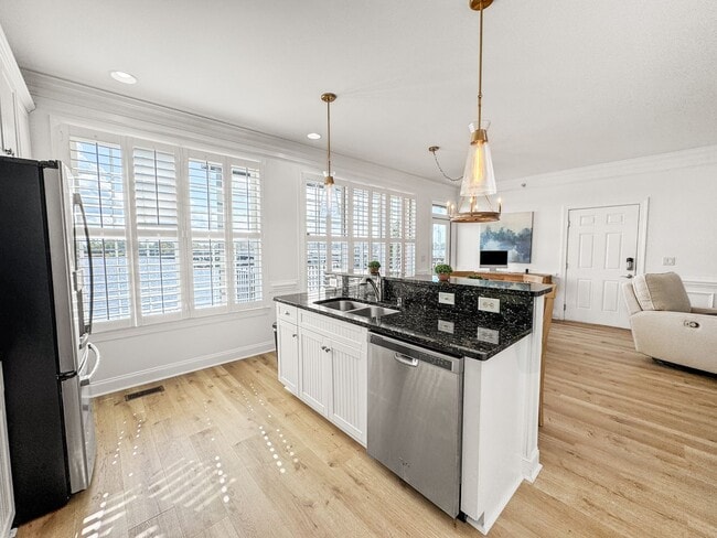 Building Photo - Fully Furnished Waterfront Elegance on Mai...