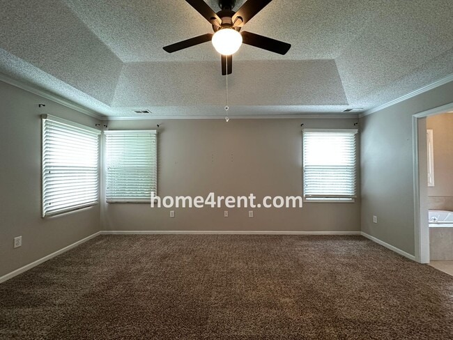 Building Photo - Updated Kitchen, Large Two Tiered Deck, Finished Basement in Blue Valley Schools!