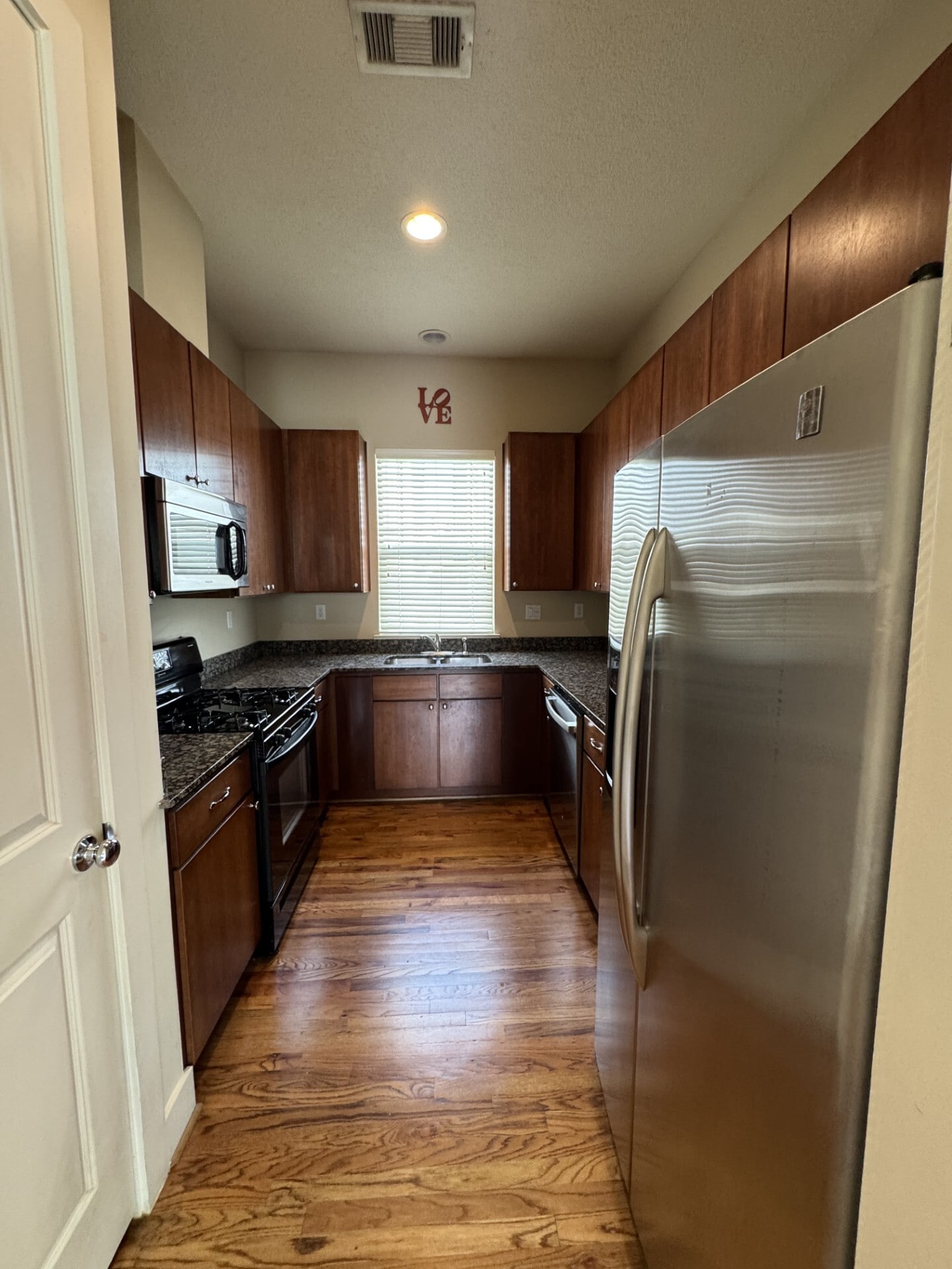 Kitchen, all appliances included, new large fridge, new dishwasher - 855 W 25th St