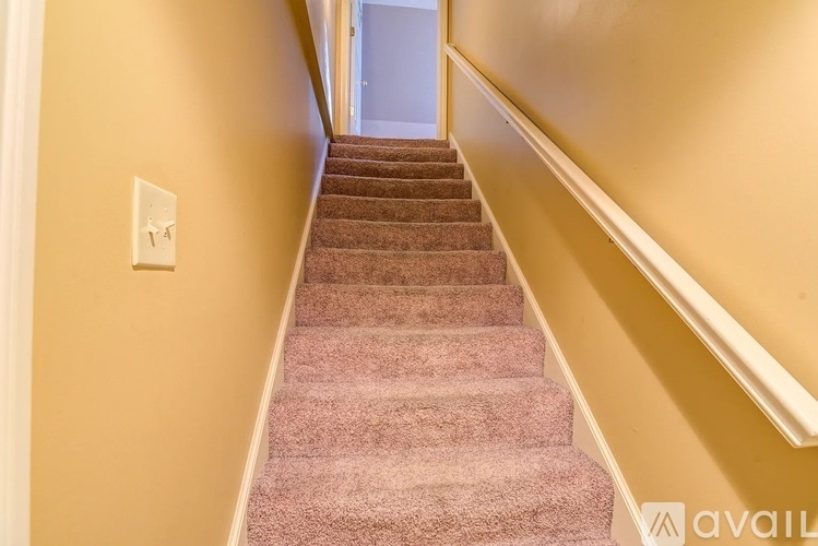 Stairs from garage to apartment - 8 Moonlit Dr