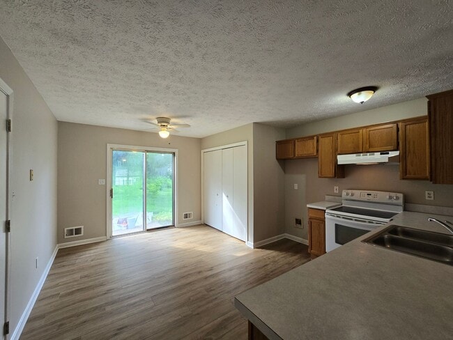 Building Photo - FOR RENT! Jeffersontown! 3 Bedrooms, 2 Full Bathrooms. $1,599/month. NEWer Paint, NEWer Hardwood ...