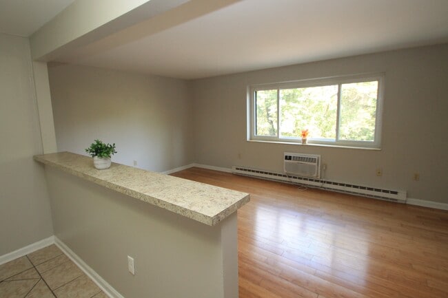 Unit C Living Room - Apartments at Logan Station