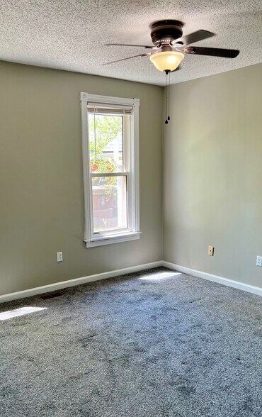 lots of light in the first bedroom - 454 Forest St