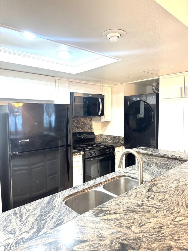 new kitchen Moen faucet - 8463 De Soto Ave